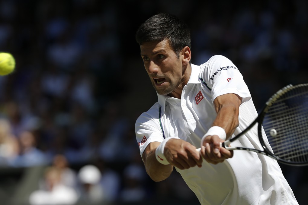 Novak Djokovic fires back a shot to Richard Gasquet. Photos: AP