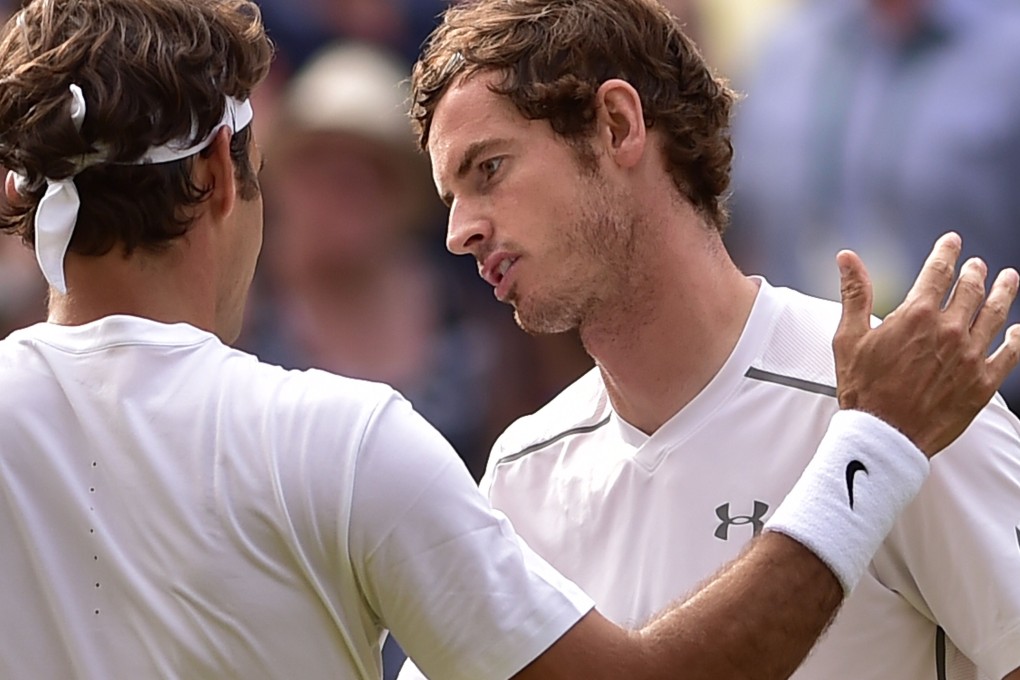 Andy Murray congratulates Roger Federer. Photo: AFP