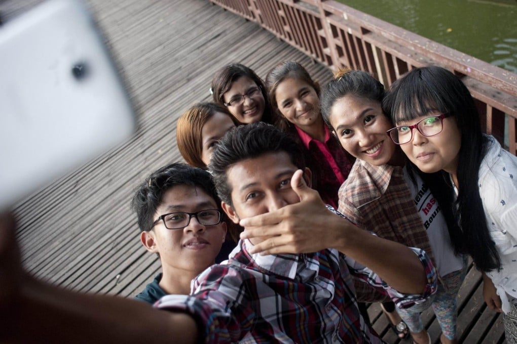 The 'My Friend' selfies are a reaction to hate speech.Photo: AFP