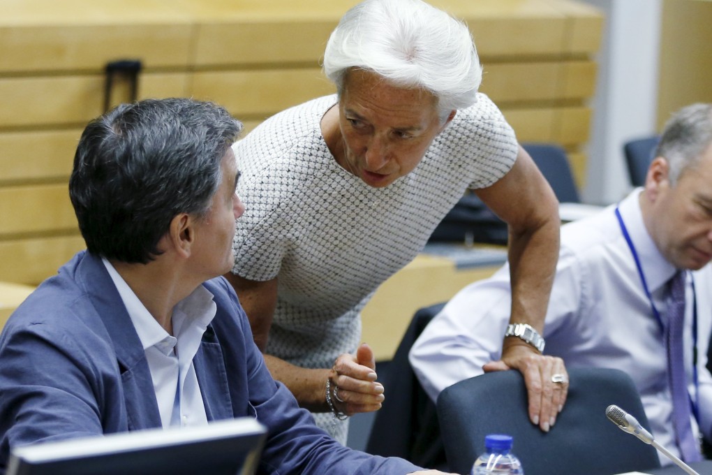 Greek Finance Minister Tsakalotos and IMF Managing Director Lagarde during an euro zone finance ministers meeting in Brussels yesterday. Photo: Reuters