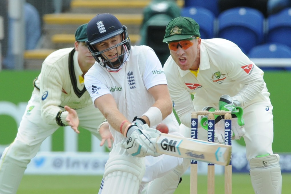 England’s Joe Root plays a shot watched by wicketkeeper Brad Haddin. Photo: AP