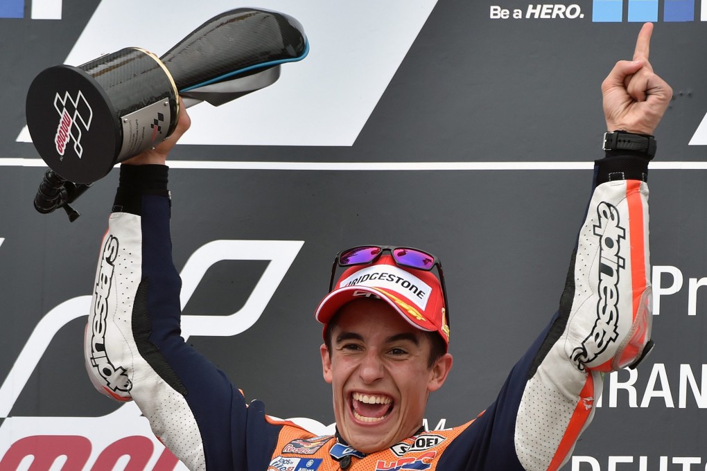 Honda rider Marc Marquez celebrates his MotoGP victory at the Sachsenring racing circuit in Hohenstein-Ernstthal, Germany. Photo: EPA