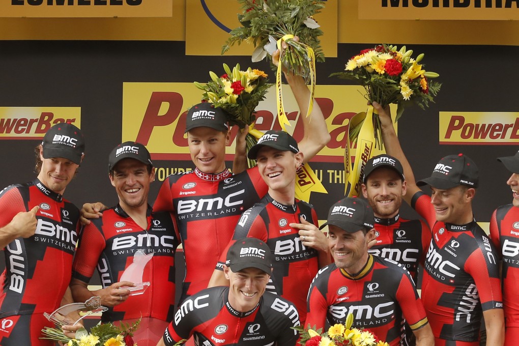 Tejay van Garderen (centre) and BMC Racing Team celebrate winning the ninth stage of the Tour de France, a 28-kilometre team time trial from Vannes to Plumelec. Photos: AP