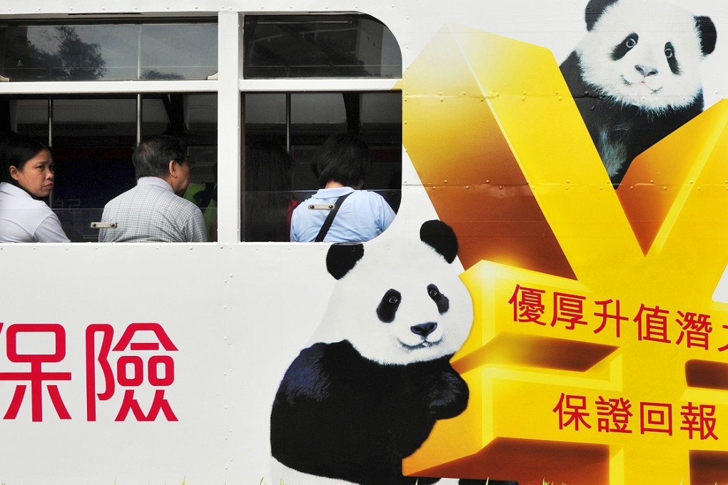 Advertisement of an insurance product on a tram in Hong Kong. Photo: AFP