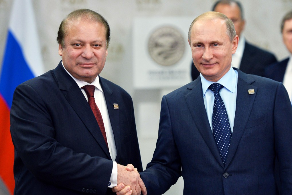Pakistani Prime Minister Nawaz Sharif (left) shakes hands with Russian President Vladimir Putin during their meeting at the SCO (Shanghai Cooperation Organisation) summit in Ufa, Russia. Photo: EPA