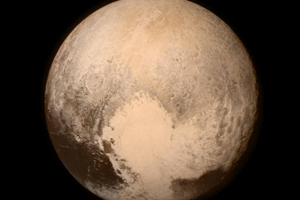 Pluto is seen in a photo taken from the New Horizons spacecraft, the best-ever image of the planet yet. Nasa officials expect even better photos to come. Photo: AP