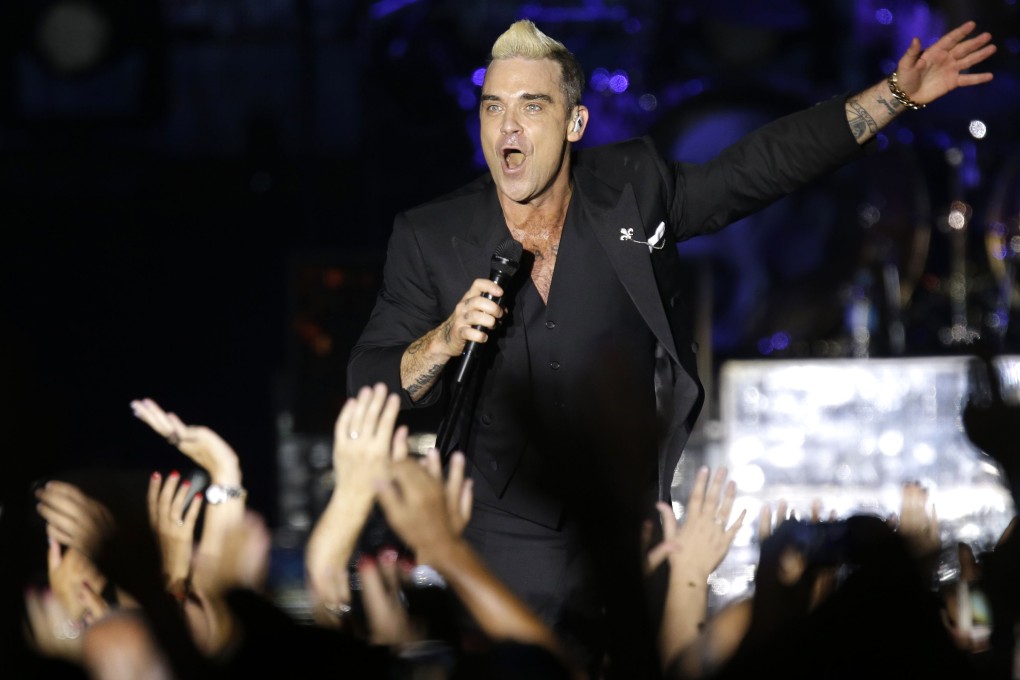 Robbie Williams performing in Monaco this week. Photo: AFP/Pool