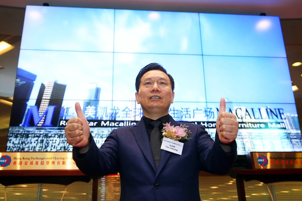 Che Jianxin pictured at the listing ceremony for his firm in Hong Kong. Photo: SCMP Pictures