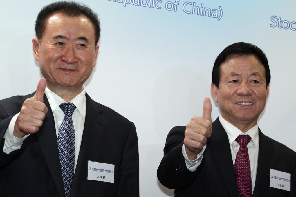 Wang Jianlin and Ding Benxi, of Dalian Wanda, have warned staff the company takes a zero-tolerance approach to graft. Photo: Dickson Lee