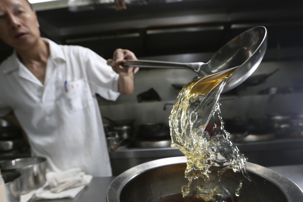 Under a proposed law, cooking oil must be shown to meet certain standards, while used oil should only be collected by registered recyclers. Photo: Sam Tsang