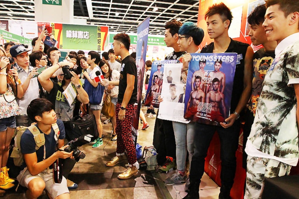Male pseudo-models take centre stage at Hong Kong Book Fair. Photo: Felix Wong