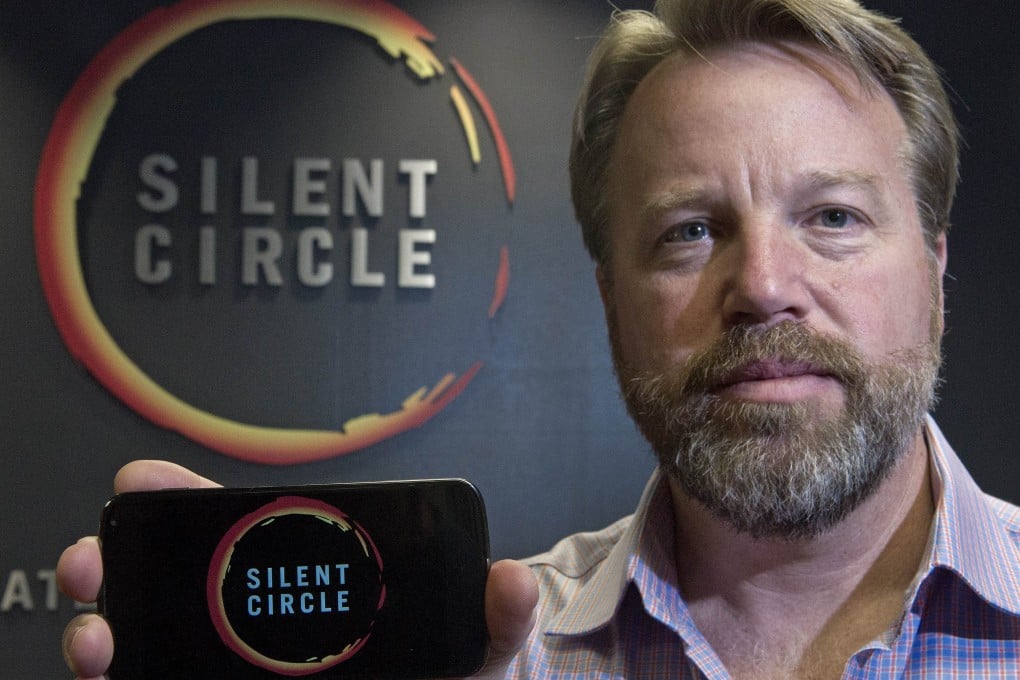 Silent Circle chief Mike Janke with a smartphone similar in styling to the original encrypted Blackphone. Photo: AFP