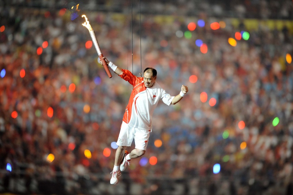 Former gymnast turned entrepreneur Li Ning was granted the honour of lighting the cauldron inside the 'Bird's Nest' National Stadium to mark the start of the hugely successful 2008 Beijing Olympic Games. Photo: Xinhua