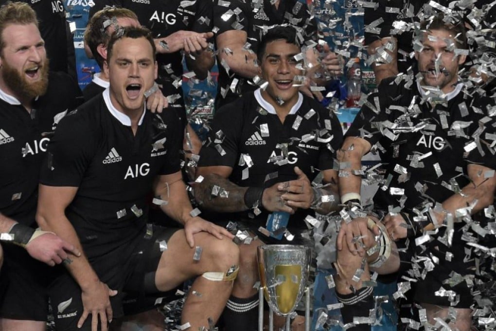 New Zealand celebrate after they retained the Rugby Championship following their 34-13 win over Argentina in September 2014. Photo: AFP