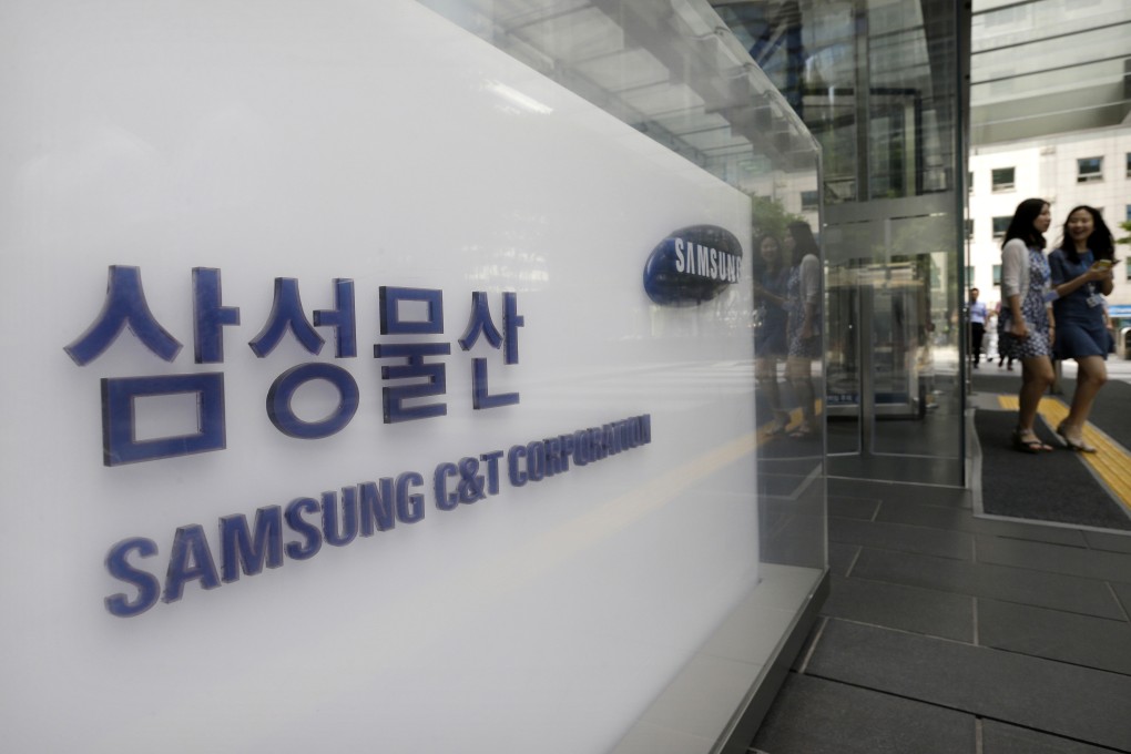 At an often-heated shareholder meeting, investors in builder Samsung C&T Corp approved an all-share takeover offer from sister firm Cheil Industries. Photo: AP