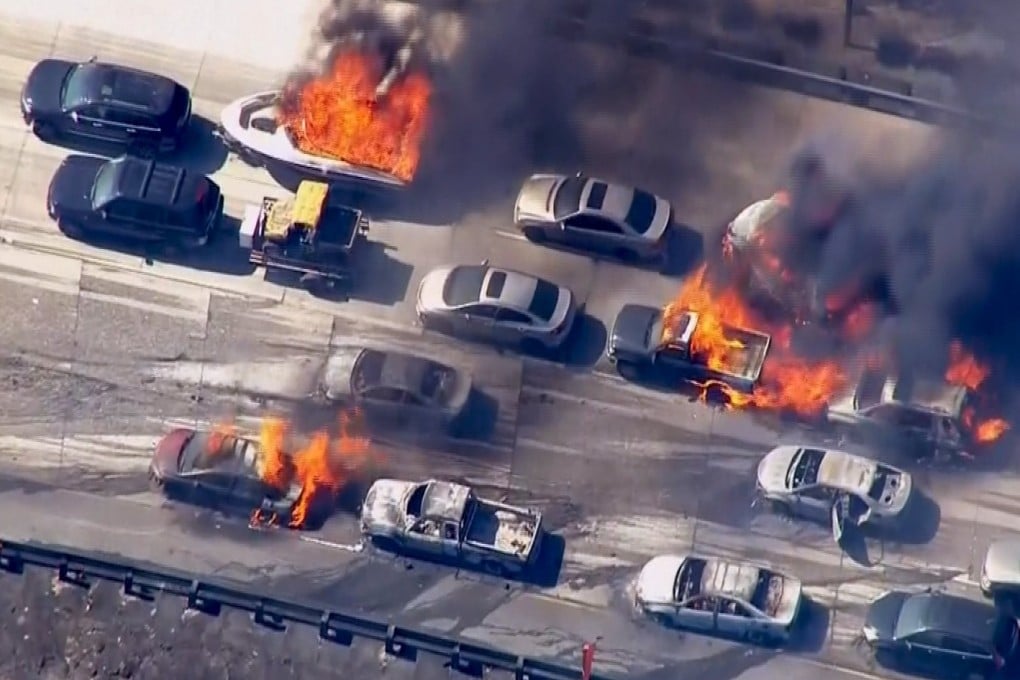 Cars are shown burning on the Interstate 15 freeway in the Cajon Pass, California. Photo: Reuters
