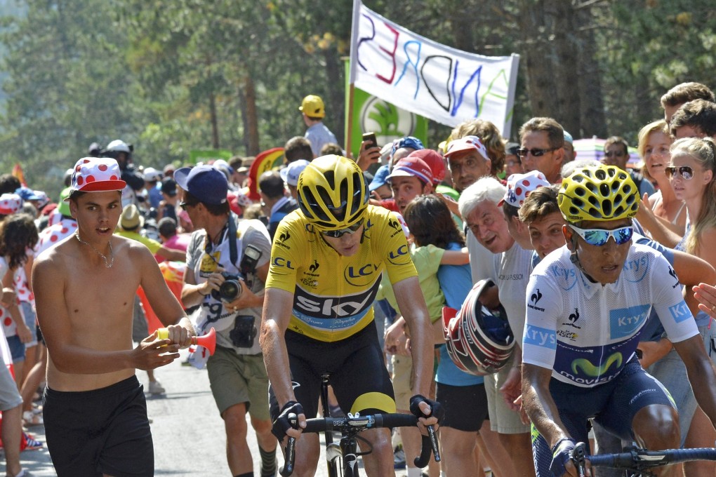 Fans shout at Chris Froome. Photo: Reuters