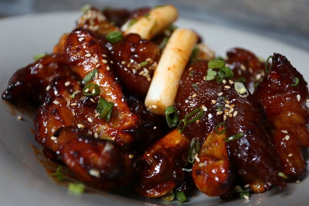 Mini jok — pig's trotters and topokki (Korean rice cake) in a gooey red sauce.