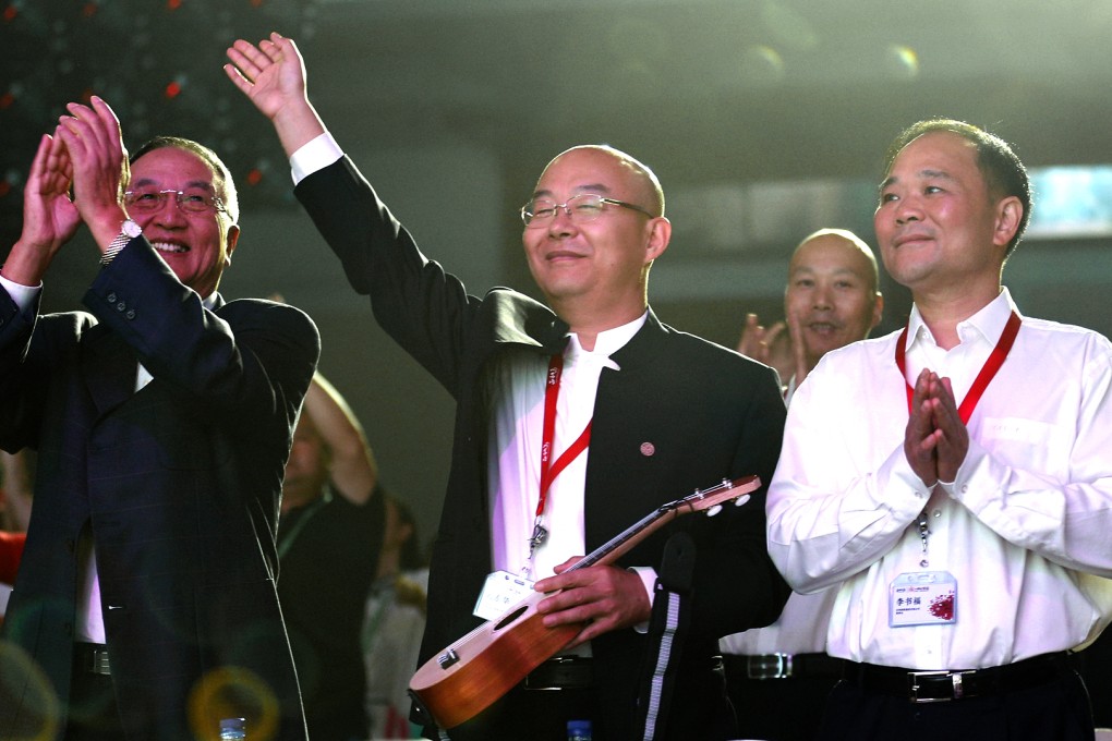 Zhenghe Island founder Liu Donghua (centre) celebrates the third anniversary of the exclusive social media platform with Chinese entrepreneurs. Photo: SCMP Pictures