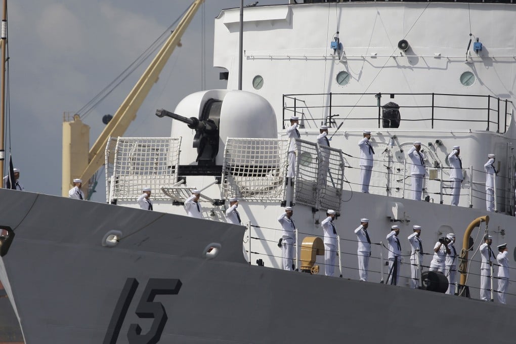 Filipino sailors salute on board the BRP Gregorio Del Pilar, one of the largest warships of Philippine navy. Photo: AP