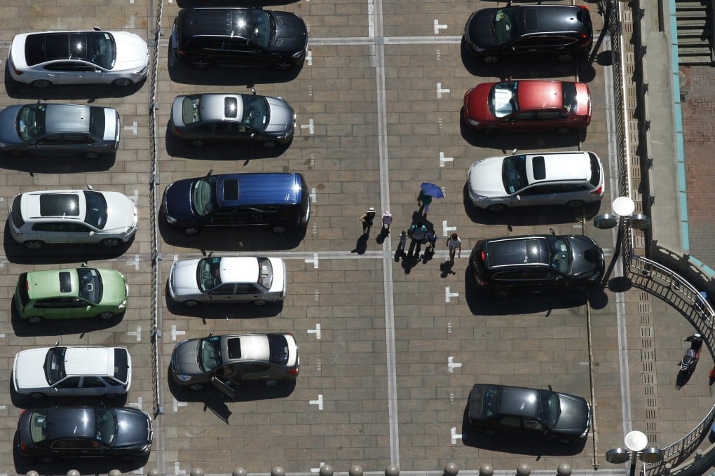 Empty lots can be hard to find in the Chinese capital, which data shows has around 5.5 million cars. Photo: EPA