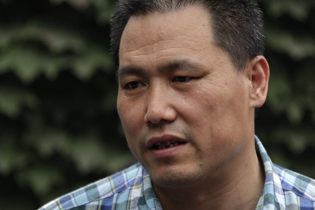 Chinese human rights lawyer Pu Zhiqiang has not been able to meet his lawyers for a month, his wife says. Photo: Reuters