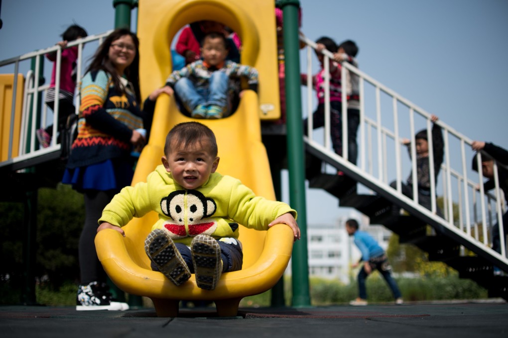 Children playing in the schoolyard of Technical Secondary School in Rudong, Jiangsu province. Photo: AFP