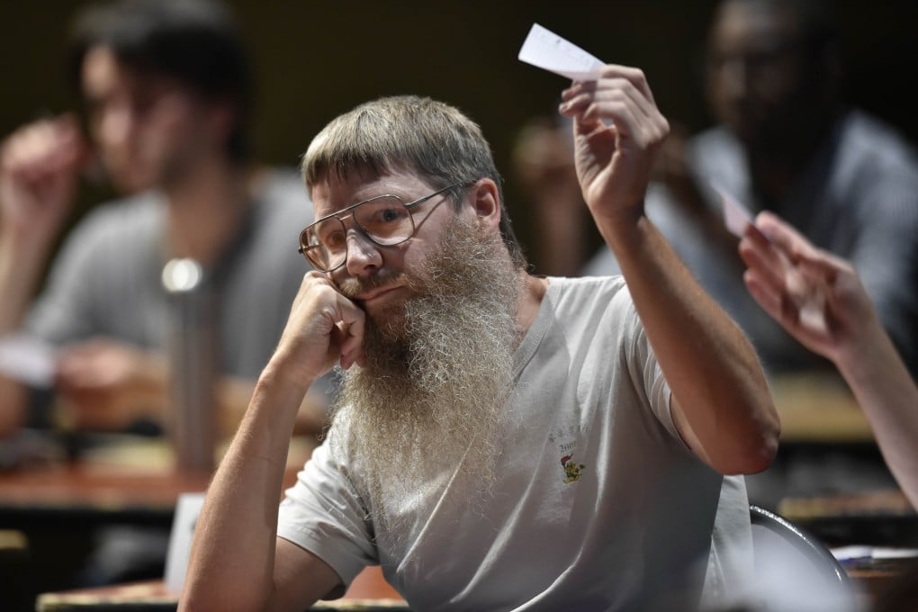 New Zealand's Nigel Richards competes in a category of the Francophone Scrabble World Championships in Louvain-La-Neuve. Nigel Richards, a 48-year-old New Zealander who was crowned the champion of Francophone Scrabble on July 20, doesn't speak a word of French. Photo: AFP