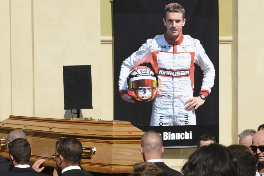 Pallbearers carry the coffin of late Formula One driver Jules Bianchi followed by family members and his father Philippe Bianchi (right) before the funeral ceremony in Nice, France. Photo: Reuters
