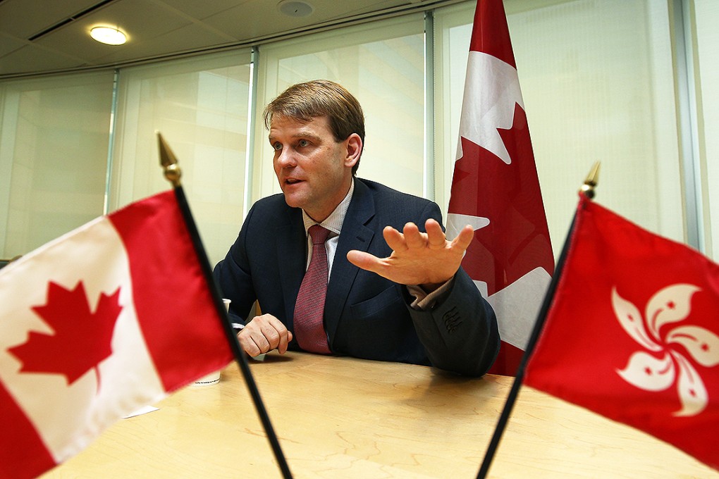 Canadian Immigration Minister Chris Alexander in an interview with the SCMP in Hong Kong last year, when he hailed the benefits of the new Immigrant Investor Venture Capital scheme. Photo: Jonathan Wong