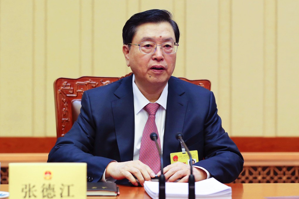 Zhang said the central government's approach would gradually push for democratic development. Photo: Xinhua