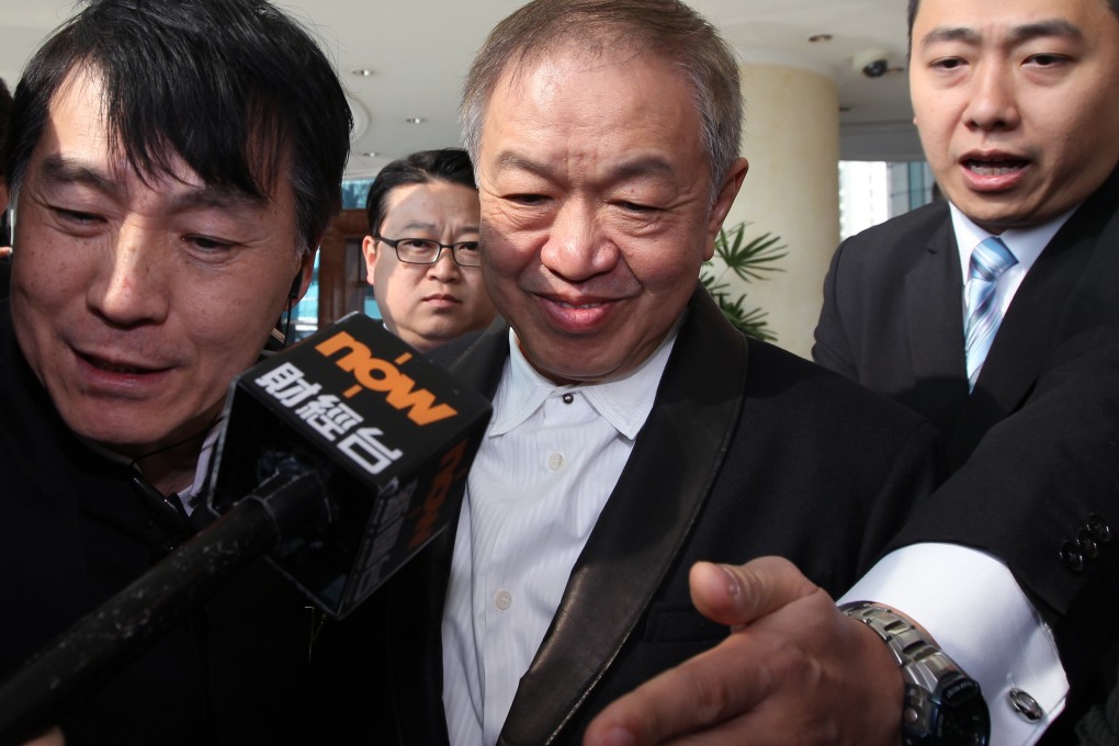 Power Assets chairman Canning Fok (centre) says the group's cash position is strong. Photo: Nora Tam