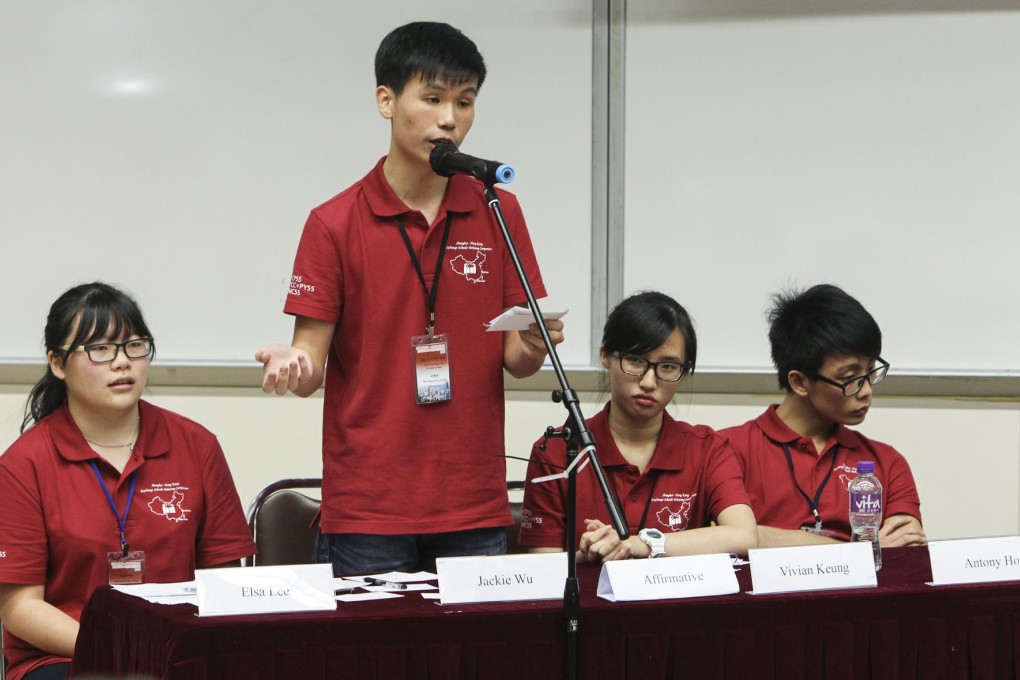 A Hong Kong team member speaks at this month's Shanghai-HK Cultural Exchange and Debating Competition at Baptist University. Photos: Franke Tsang