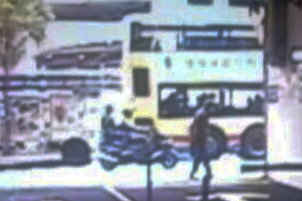 A CCTV photo believed to be of the two suspects on their motorcycle in Lei King Road, Sai Wan Ho, before yesterday''s brutal attack. Photo: PPRB/PPRB