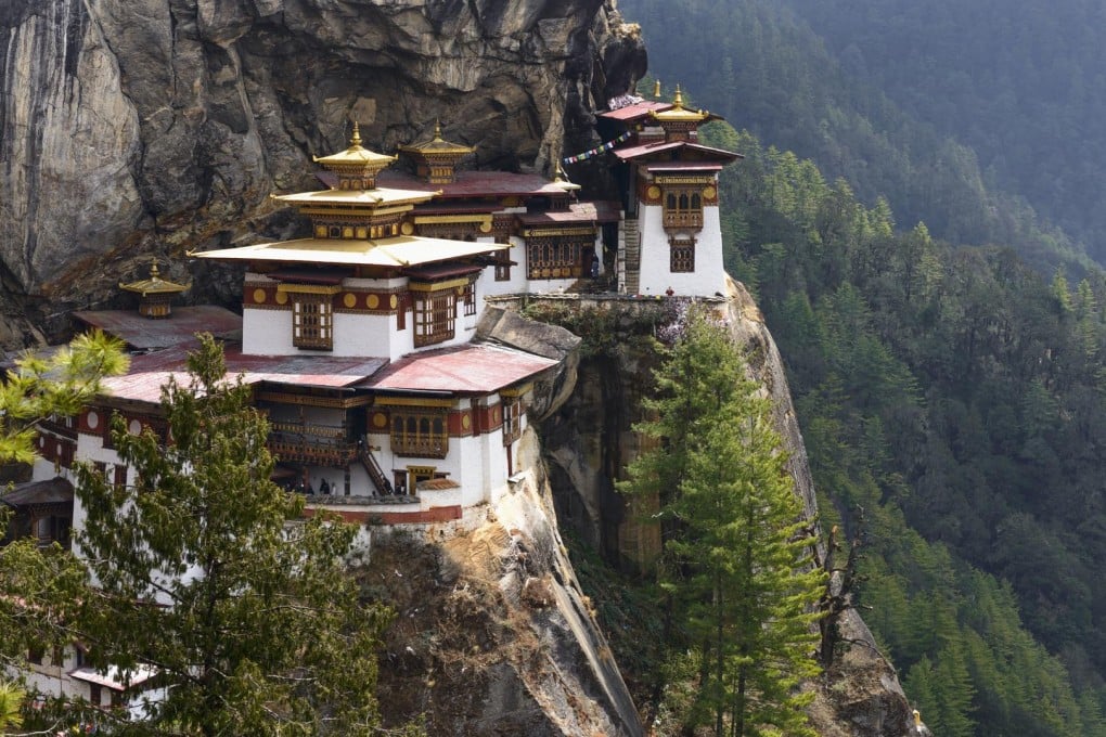 The Tiger's Nest Temple, at Paro, in Bhutan. Photos: Corbis; Dinah Gardner; AFP