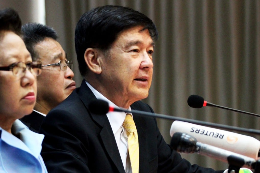 Wanchai Roujanavong (centre), spokesman for the office of the Attorney General of Thailand, speaks during a press conference in Bangkok on July 24, 2015. Photo: AFP