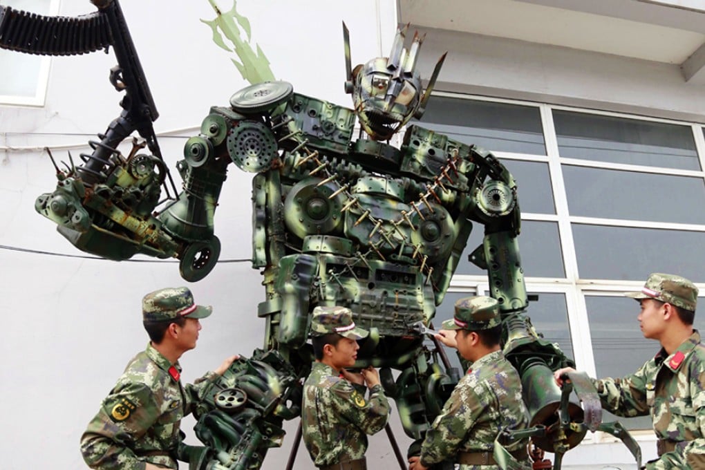 The troops with their creation crafted out of old car parts. Photo: China Military Online