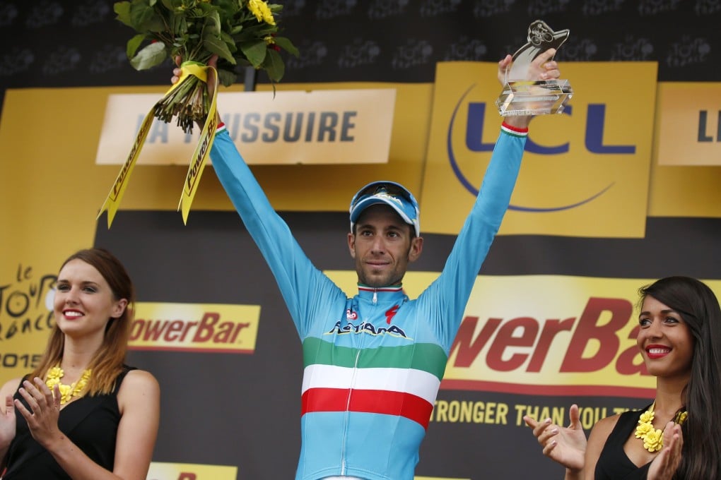 Astana rider Vincenzo Nibali of Italy celebrates after winning the 19th stage of the Tour de France. Photo: Reuters