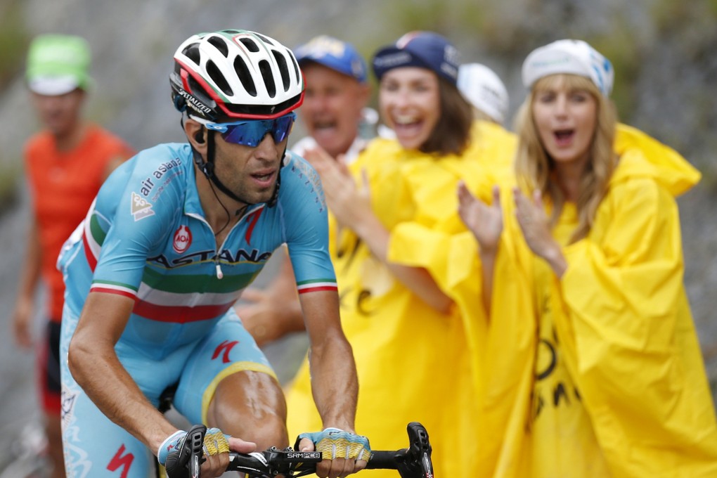 Vincenzo Nibali is roared on as he goes it alone on the 19th stage. Photo: Reuters