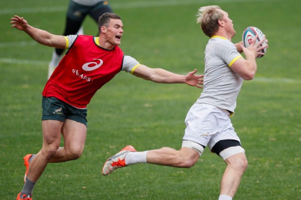 South Africa captain Schalk Burger is chased by young team-mate Jesse Kriel during the captain's run in Johannesburg on Friday. The Boks face off against current world champions New Zealand on Saturday. Photos: EPA