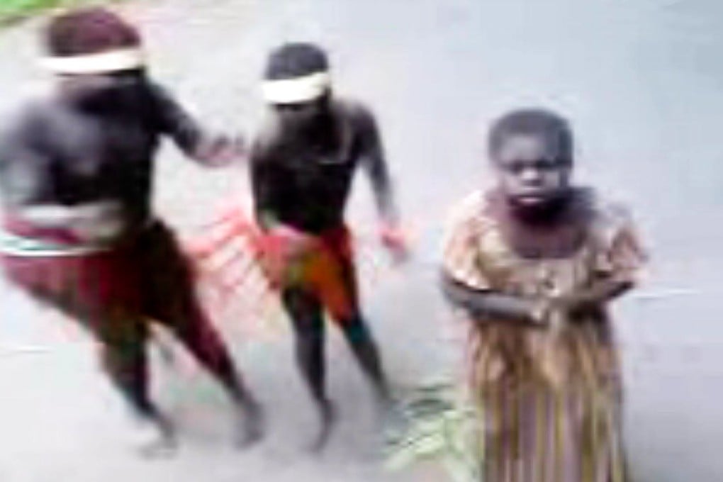 Young girls from the Jarawa tribe of the Andaman Islands dance in return for food. The Jarawa live in the jungles of the Indian territory of South Andaman Island, one of a chain of islands in the Bay of Bengal. Photo: SCMP Pictures
