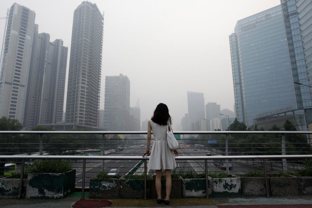 Views from an overhead bridge near the construction site of "Kaisa Plaza", then named "Changan No. 8", in Beijing's central business district. Photo: Reuters