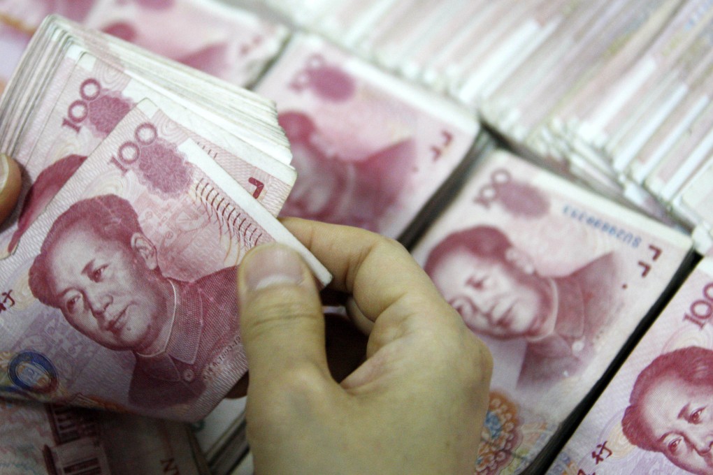 A 54-year-old woman lost 190,000 yuan (HK$240,451) after transferring it to a designated account. Photo: AFP