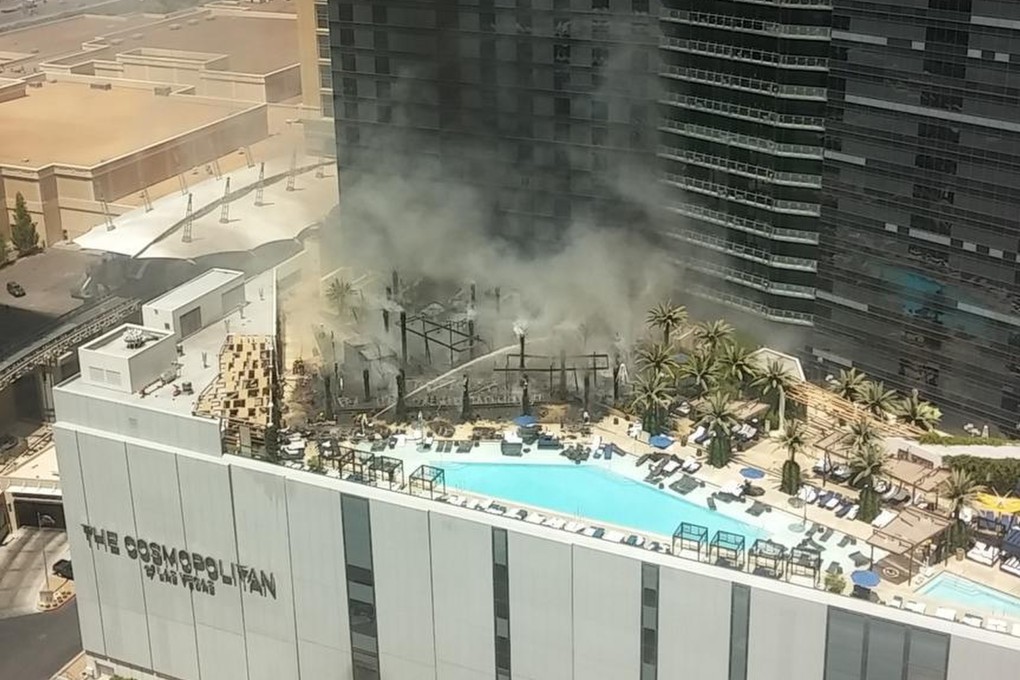 Smoke rises after a fire on the outside pool area of the Cosmopolitan Las Vegas hotel-casino in Las Vegas. Photo: AP