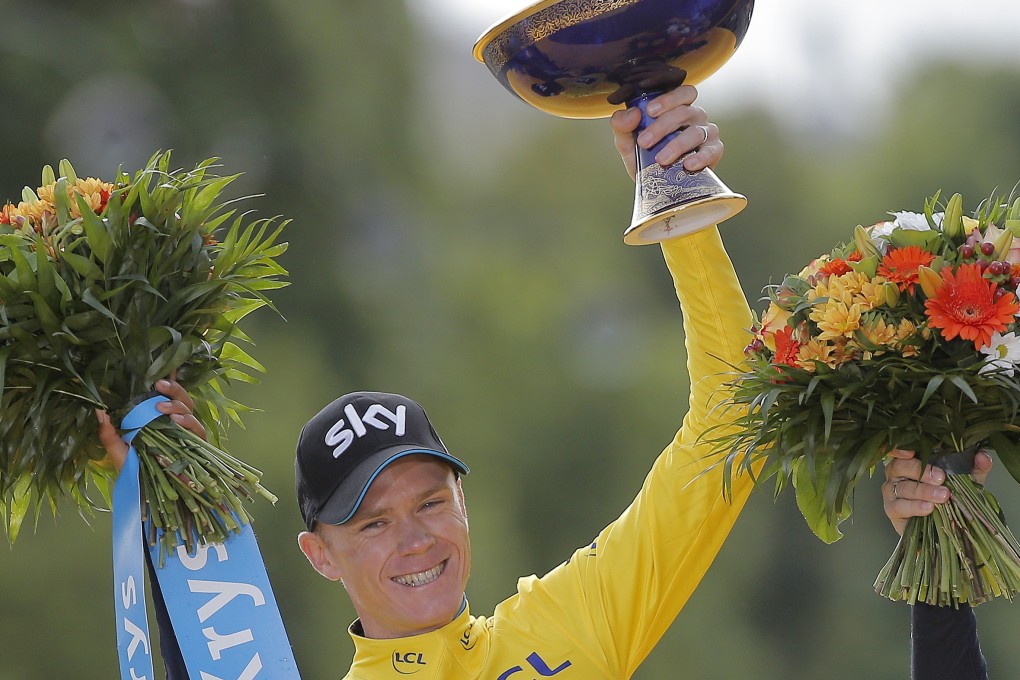 Chris Froome celebrates his second Tour victory. Photo: AP