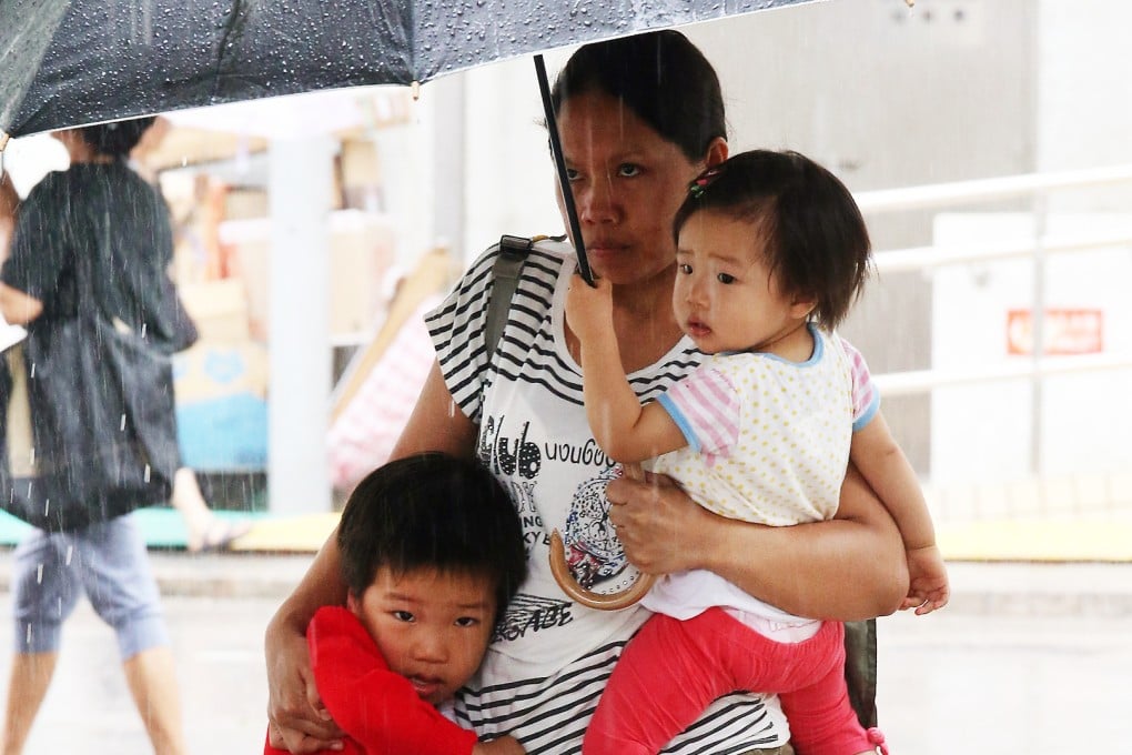 Domestic helpers may be considered by children as part of the family. Photo: David Wong