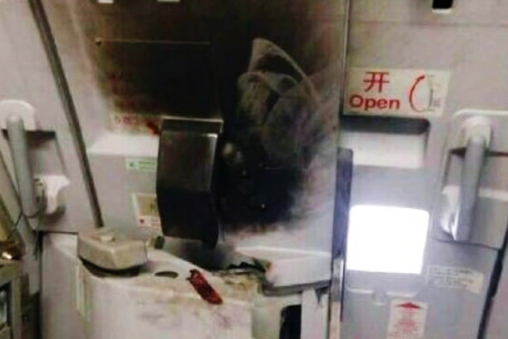 The passenger attempts to set a fire using petrol and a cigarette lighter. Photo: Weibo