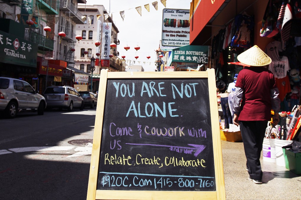 A signboard on Grant Avenue advertises the new 1920c work space and art gallery in San Francisco's Chinatown. Photo: AP