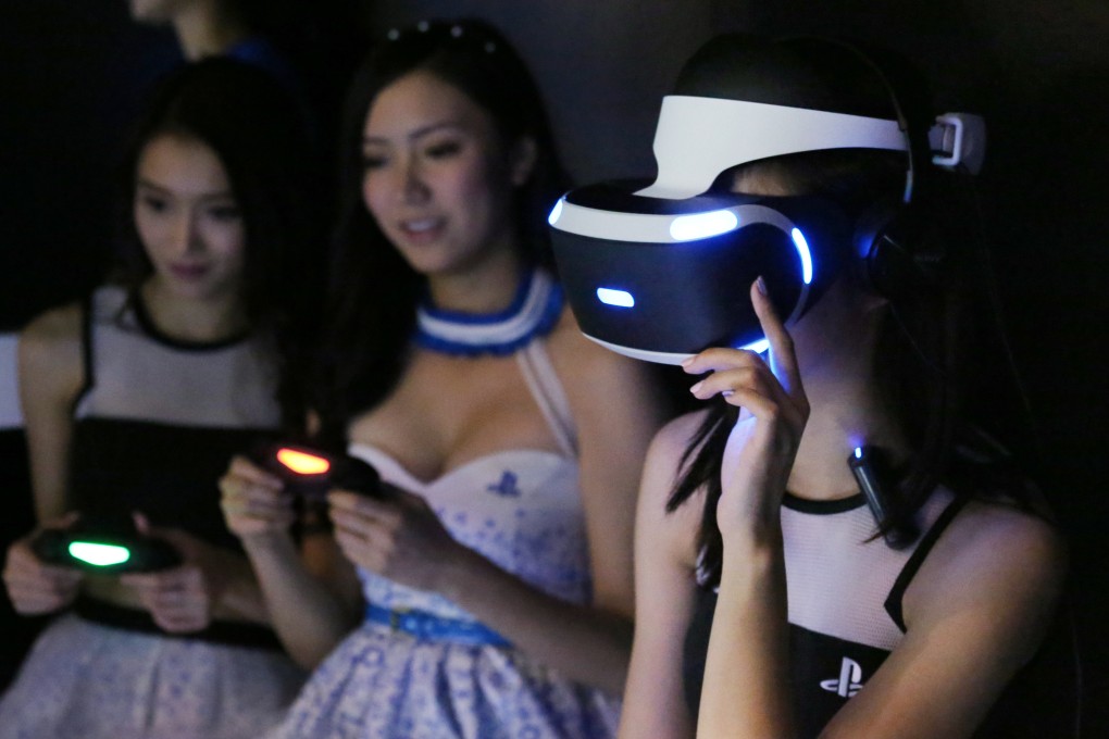 Playstation 4 virtual reality technology "Project Morpheus" is demonstrated during an anime and gaming convention in Hong Kong. Photo: Nora Tam