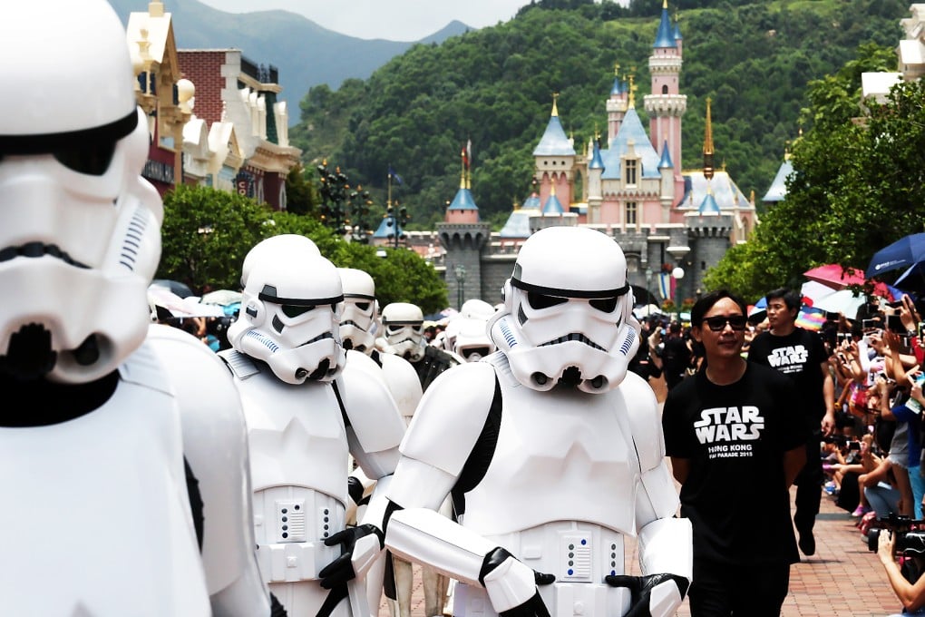Stormtroopers excite Disneyland visitors during a parade. The parade was part of Disney’s promotion of the new Star Wars movie. Photo: Jonathan Wong